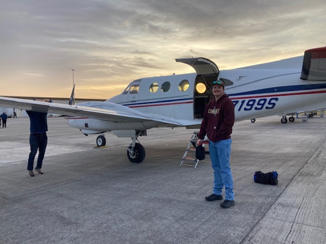 Crew member waiting to board aircraft