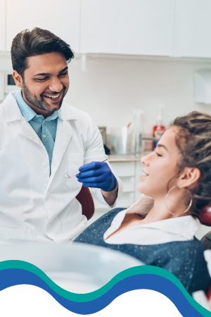 dentist talking to patient 